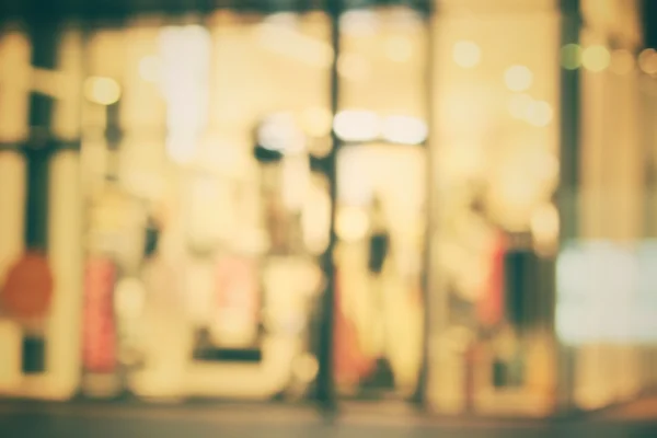 Desfocado de shopping center à noite — Fotografia de Stock