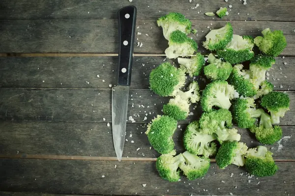 Broccoli with salt — Stock Photo, Image