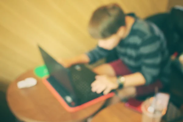 Blurred of playing on computer notebook — Stock Photo, Image