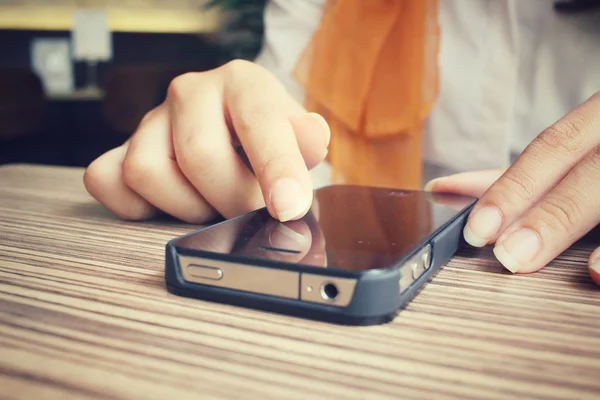 Businesswoman using smart phone in the cafe — Stock Photo, Image