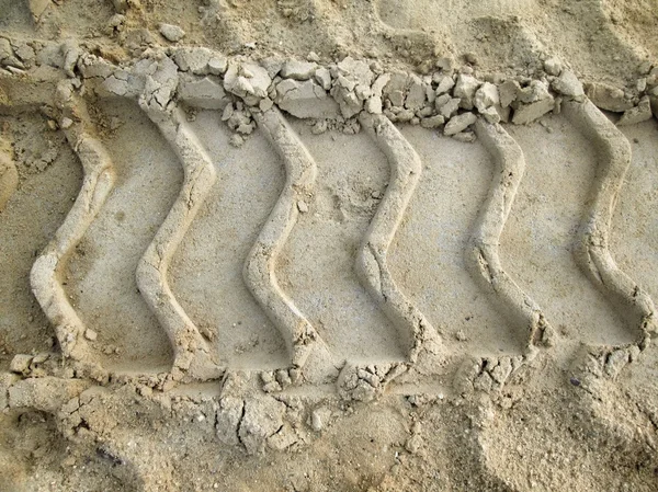 Radspuren auf dem Boden. — Stockfoto