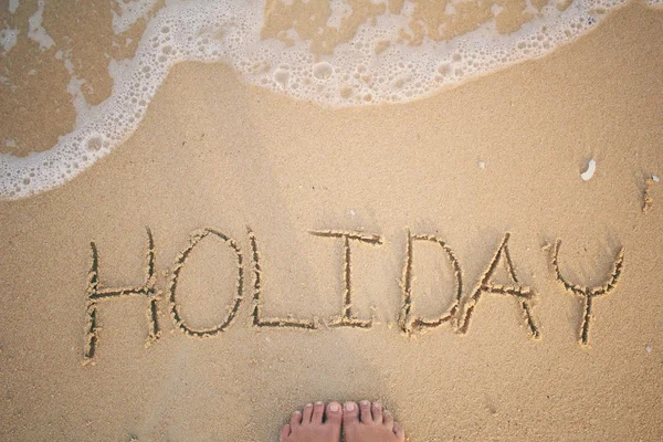 Selfie di vacanza parola scritta in sabbia sulla spiaggia — Foto Stock