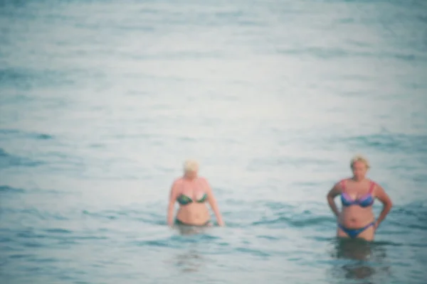 Wazig zwemmen aan de zee — Stockfoto