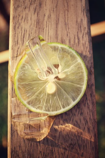 Slice of lemon with ice — Stock Photo, Image