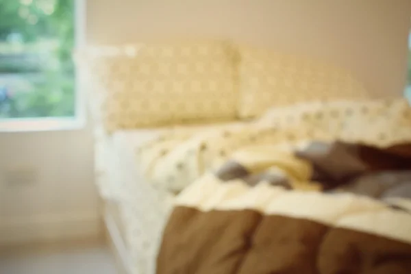 Blurred of bed pillows at hotel — Stock Photo, Image