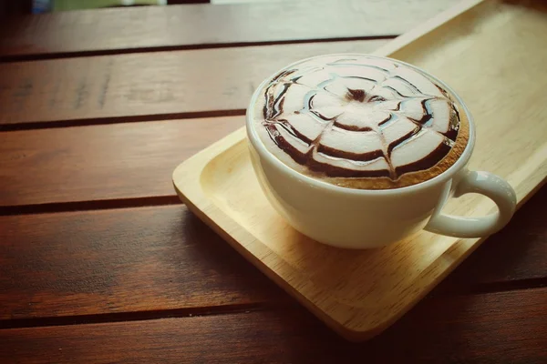 Vintage latte art coffee — Stock Photo, Image