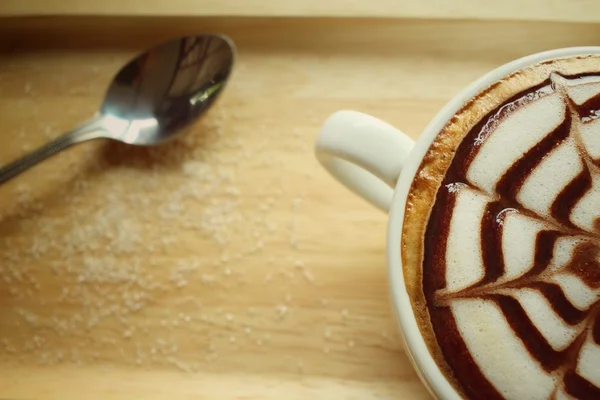 Vintage latte art coffee — Stock Photo, Image