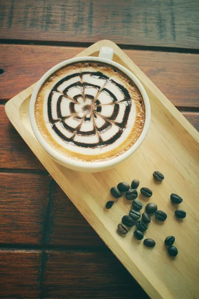 Vintage latte art coffee — Stock Photo, Image