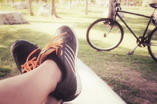 Selfie of sneakers with bike — Stock Photo, Image