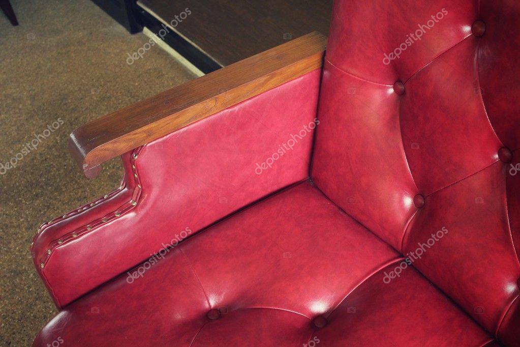 Vintage red leather sofa Stock Photo by ©luknaja 78049732