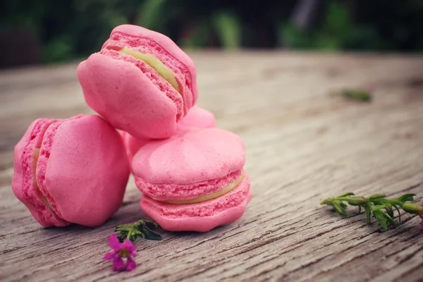 French macaroons with pink flowers