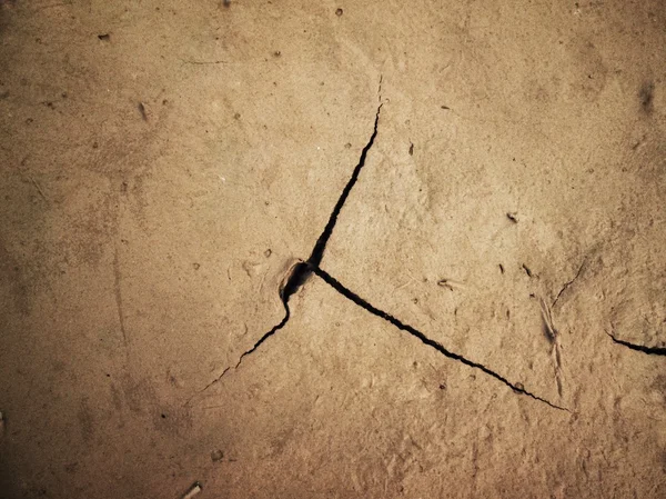 Cracked dry soil — Stock Photo, Image