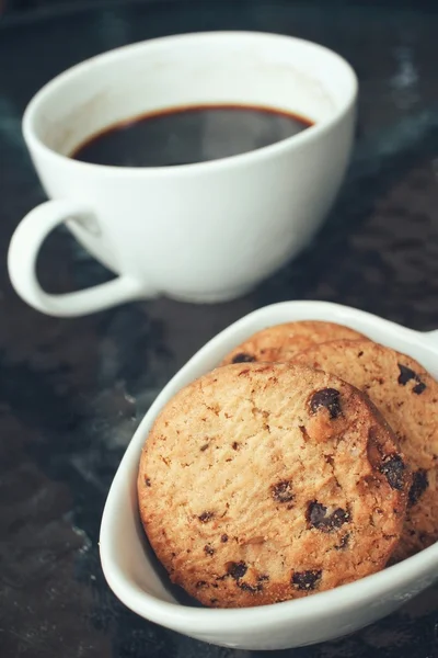 Hot coffee with chocolate cookies — Stock Photo, Image