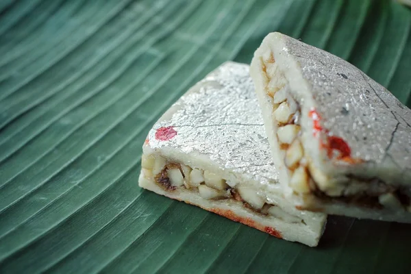 Indian sweets on banana leaf — Stock Photo, Image