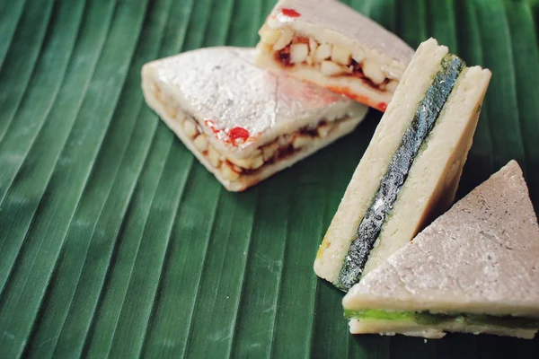 Indian sweets on banana leaf — Stock Photo, Image