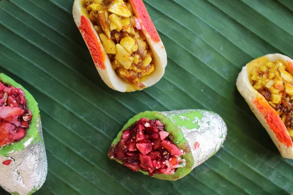 Indian sweets on banana leaf — Stock Photo, Image