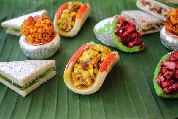 Indian sweets on banana leaf — Stock Photo, Image