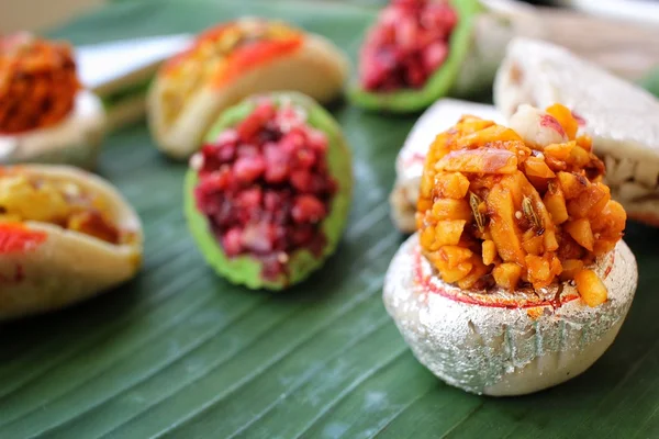 Indian sweets on banana leaf — Stock Photo, Image