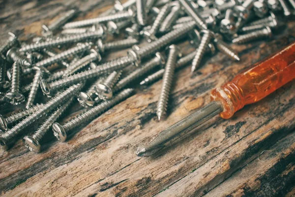 Screwdriver with screw — Stock Photo, Image