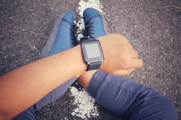 Sneakers with smartwatch — Stock Photo, Image