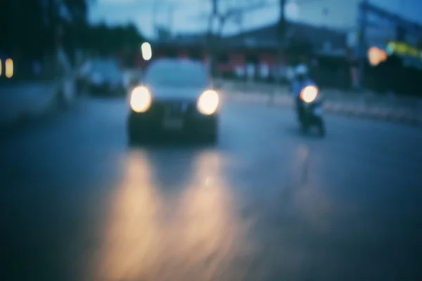 Difuminado de coche en la ciudad por la noche —  Fotos de Stock