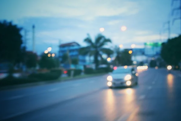 Blurred of car in city at night — Stock Photo, Image