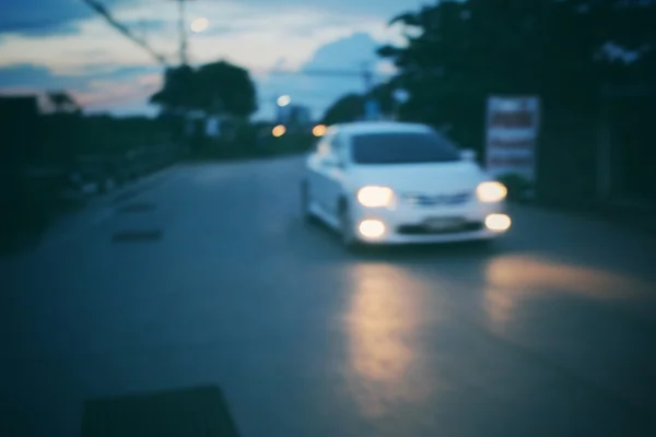 Blurred of car in city at night — Stock Photo, Image