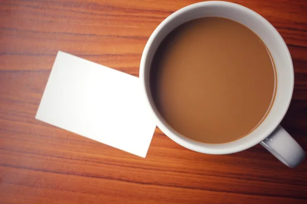 Tasse à café avec carte de visite vierge — Photo