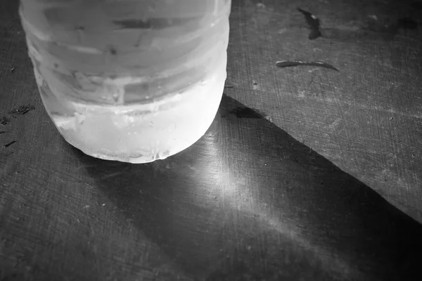 Water bottle with shadow — Stock Photo, Image