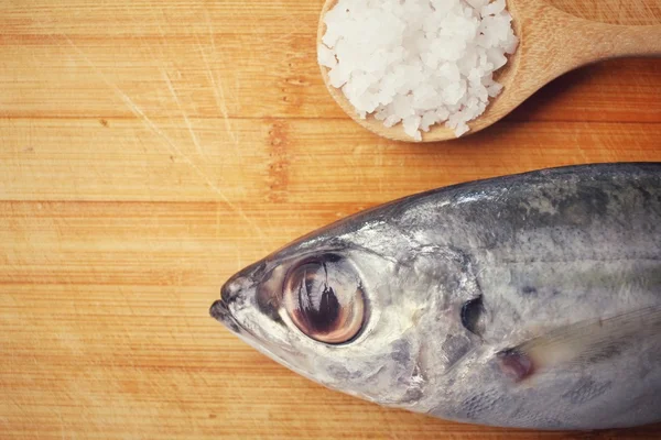 Fresh raw fish with salt — Stock Photo, Image