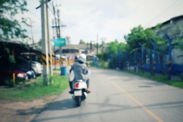 Desfocado de motocicleta na estrada — Fotografia de Stock