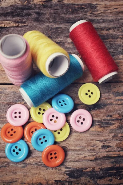 Colorful sewing buttons with thread — Stock Photo, Image