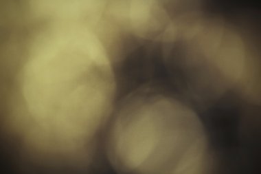 Siyah arkaplanda altın bokeh