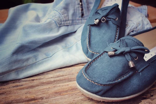 Sneakers with jeans — Stock Photo, Image