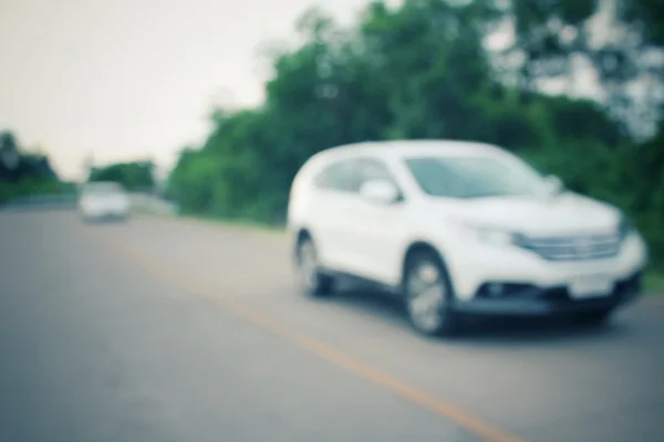 Rozmazané auto na silnici — Stock fotografie