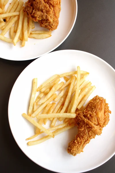 Fried chicken leg with french fries — Stock Photo, Image