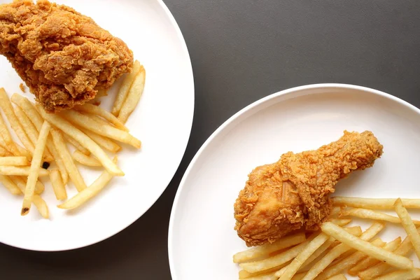 Fried chicken leg with french fries — Stock Photo, Image