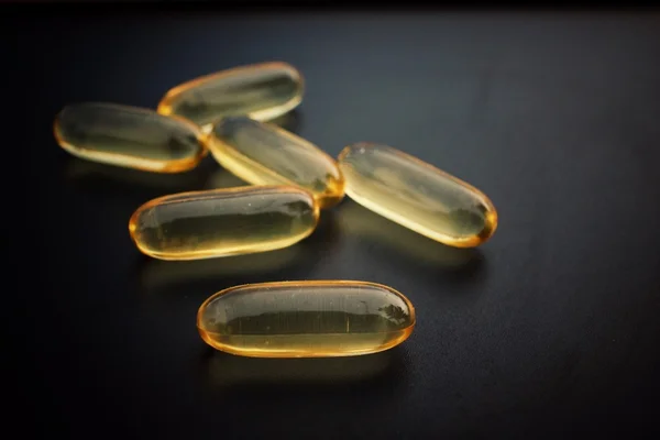 Cod liver oil capsules — Stock Photo, Image