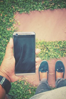 Selfie yandan ayakkabı ile akıllı telefon