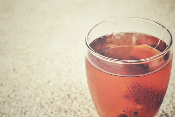 Tea bag with ice tea — Stock Photo, Image