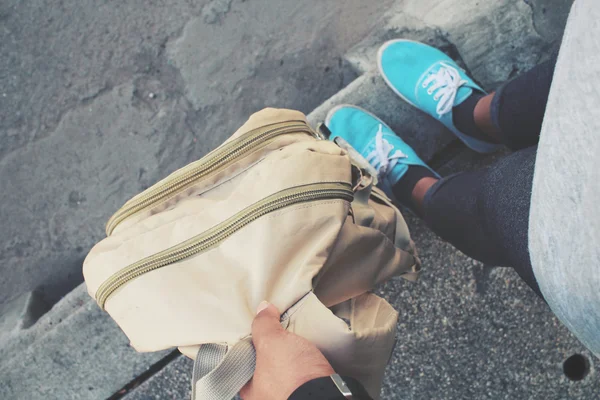 Selfie of woman tourist with a backpack standing on road — Stock Photo, Image