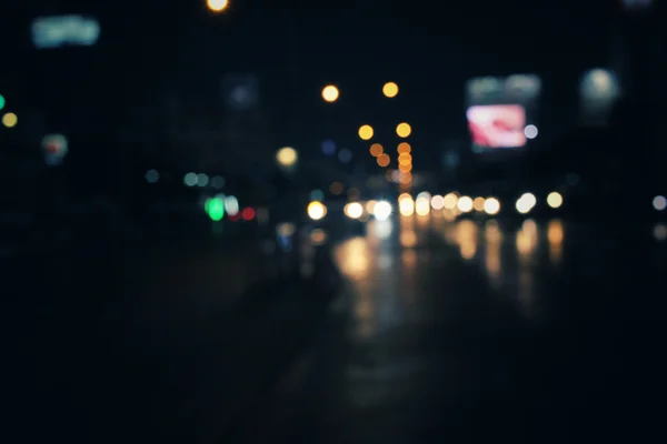 Wazig van auto in de stad 's nachts — Stockfoto