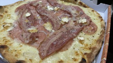 Bake homemade pizza hot from oven