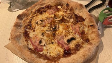 Bake homemade pizza hot from oven