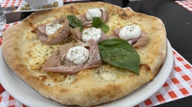 Bake homemade pizza hot from oven