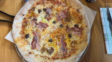 Bake homemade pizza hot from oven