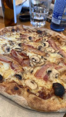 Bake homemade pizza hot from oven