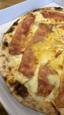 Bake homemade pizza hot from oven