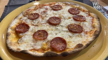 Bake homemade pizza hot from oven