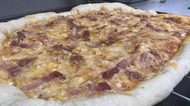 Bake homemade pizza hot from oven